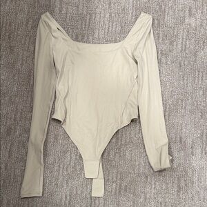 Lululemon Athletica Cream Long Sleeve Bodysuit